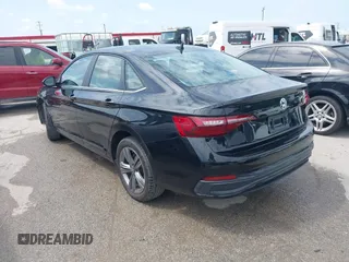 2024 Volkswagen Jetta SE with VIN 3VW7M7BU0RM059133, listed as a IAAI auction lot 42553729 with 13,091 mi miles and . Bid and sale history available at DreamBid. Image 3.