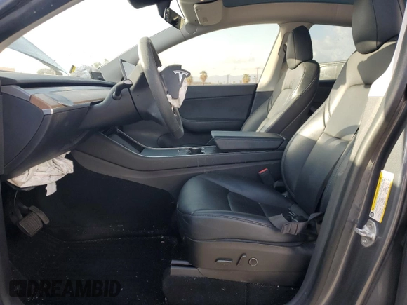 2021 Tesla Model Y Standard Range with VIN 5YJYGDED7MF109418, listed as a Copart auction lot 51590135 with 86,668 mi miles and Salvage Title. Bid and sale history available at DreamBid. Image 7.