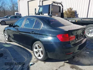 2015 BMW 3 Series 328i with VIN WBA3C1C53FK120984, listed as a IAAI auction lot 41338035 with 119,486 mi miles and . Bid and sale history available at carsss.com. Image 3.