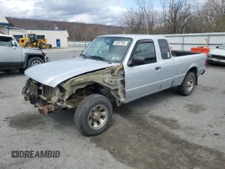 2003 Ford Ranger XL with VIN 1FTYR14V03TA40277, listed as a Copart auction lot 50887955 with 128,495 mi miles and Salvage Title. Bid and sale history available at carsss.com. Image 1.