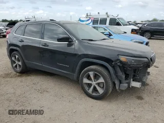 2019 Jeep Cherokee Limited with VIN 1C4PJLDN8KD128291, listed as a Copart auction lot 52923225 with 109,560 mi miles and Salvage Title. Bid and sale history available at DreamBid. Image 4.