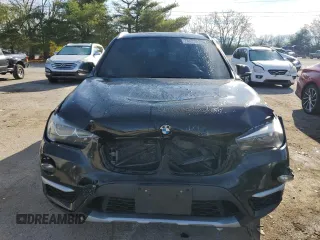2016 BMW X1 xDrive28i z VIN WBXHT3C35G5E50005, wystawiony jako Copart lot #74476533 z przebiegiem 128 031 mil mil oraz Szkoda całkowita • Salvage title. Historia ofert i sprzedaży dostępna na DreamBid. Obrazek 5.