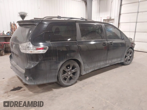 2011 Toyota Sienna SE with VIN 5TDXK3DC6BS112848, listed as a IAAI auction lot 41506859 with 298,533 mi miles. Bid and sale history available at carsss.com. Image 4.