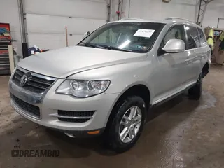 2010 Volkswagen Touareg VR6 with VIN WVGBF7A93AD004398, listed as a IAAI auction lot 41470257 with 108,181 mi miles and . Bid and sale history available at DreamBid. Image 2.