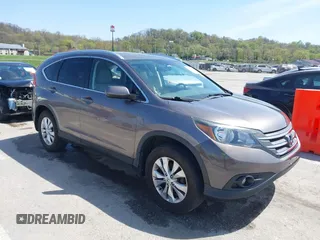 2014 Honda CR-V EX-L with VIN 5J6RM4H70EL096555, listed as a IAAI auction lot 42038062 with 113,601 mi miles. Bid and sale history available at carsss.com. Image 1.