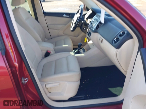 2012 Volkswagen Tiguan S with VIN WVGBV7AX2CW078629, listed as a IAAI auction lot 41332445 with 94,239 mi miles and . Bid and sale history available at DreamBid. Image 5.