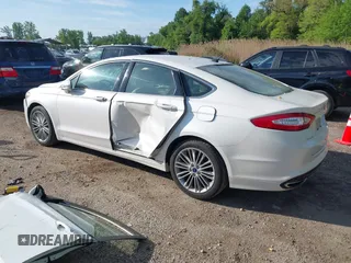 2014 Ford Fusion SE with VIN 3FA6P0H92ER340353, listed as a IAAI auction lot 42126171 with 104,484 mi miles and . Bid and sale history available at DreamBid. Image 3.