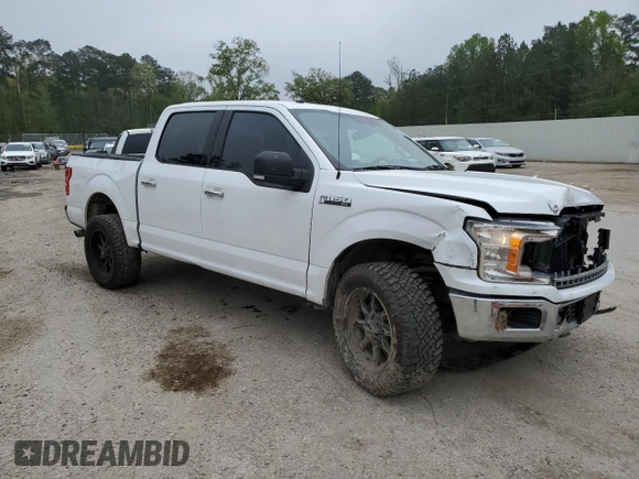 2018 Ford F-150 XL with VIN 1FTEW1C53JKC18828, listed as a Copart auction lot 50357415 with 128,689 mi miles and Salvage Title. Bid and sale history available at DreamBid. Image 4.