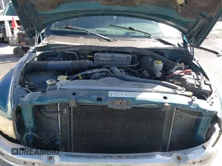 1999 Dodge 1500 z VIN 1B7HF13Z5XJ547187, wystawiony jako IAAI lot #41687655 z przebiegiem 187 722 mil mil oraz . Historia ofert i sprzedaży dostępna na DreamBid. Obrazek 10.