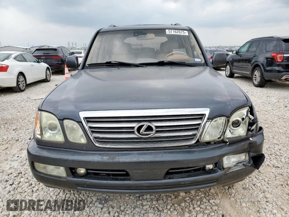2003 Lexus LX 470 z VIN JTJHT00W033530306, wystawiony jako Copart lot #57162675 z przebiegiem 185 458 mil mil oraz Szkoda całkowita • Salvage title. Historia ofert i sprzedaży dostępna na DreamBid. Obrazek 5.