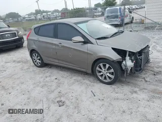 2014 Hyundai Accent SE with VIN KMHCU5AE0EU169214, listed as a IAAI auction lot 41925749 with 119,544 mi miles. Bid and sale history available at carsss.com. Image 1.