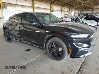2023 Ford Mustang Mach-E Premium with VIN 3FMTK3R72PMA02392, listed as a Copart auction lot 63351565 with 35,836 mi miles and Salvage title. Bid and sale history available at DreamBid. Image 4.