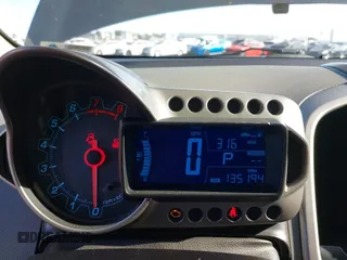 2014 Chevrolet Sonic LT with VIN 1G1JC5SH9E4109920, listed as a IAAI auction lot 42271051 with 135,194 mi miles and . Bid and sale history available at DreamBid. Image 7.
