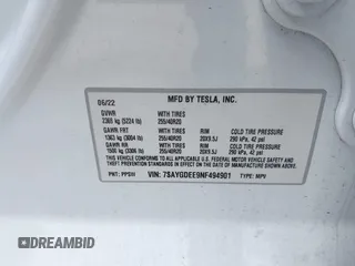 2022 Tesla Model Y Long Range z VIN 7SAYGDEE9NF494901, wystawiony jako IAAI lot #42310520 z przebiegiem 62 515 mil mil oraz . Historia ofert i sprzedaży dostępna na DreamBid. Obrazek 9.