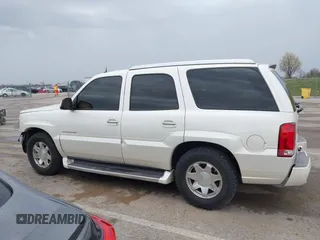 2005 Cadillac Escalade z VIN 1GYEK63N25R190908, wystawiony jako IAAI lot #41882135 z przebiegiem 243 333 mil mil oraz . Historia ofert i sprzedaży dostępna na DreamBid. Obrazek 14.