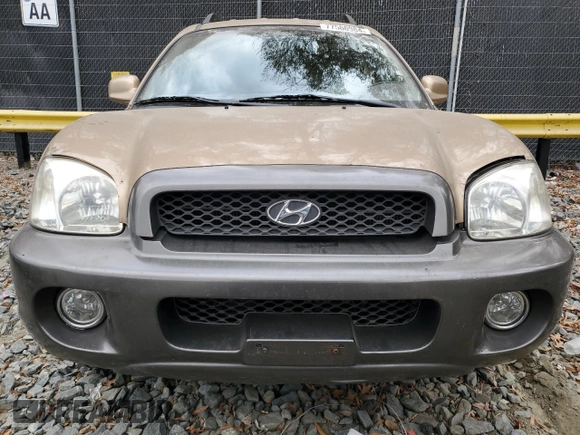 2001 Hyundai Santa Fe GLS with VIN KM8SC83D71U084837, listed as a Copart auction lot 77588984 with 102,585 mi miles and Salvage Title. Bid and sale history available at carsss.com. Image 5.