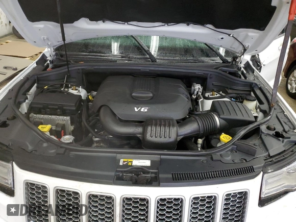 2015 Jeep Grand Cherokee Summit with VIN 1C4RJFJG9FC794992, listed as a Copart auction lot 42790355 with 74,044 mi miles and Salvage Title. Bid and sale history available at DreamBid. Image 13.