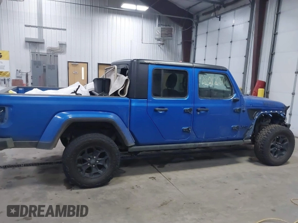 2021 Jeep Gladiator Willys with VIN 1C6HJTAG9ML535479, listed as a IAAI auction lot 41212241 with 81,044 mi miles and . Bid and sale history available at DreamBid. Image 14.
