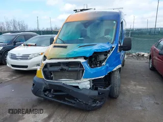 2020 Ford Transit Cargo z VIN 1FTBR2C85LKA15937, wystawiony jako IAAI lot #41673232 z przebiegiem 56 172 mil mil oraz . Historia ofert i sprzedaży dostępna na DreamBid. Obrazek 12.