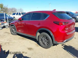 2019 Mazda CX-5 Sport with VIN JM3KFBBM2K0508743, listed as a IAAI auction lot 41288659 with 77,710 mi miles and . Bid and sale history available at DreamBid. Image 14.