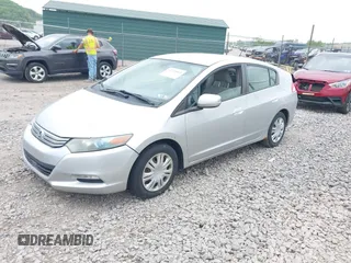 2010 Honda Insight LX with VIN JHMZE2H57AS008203, listed as a IAAI auction lot 42240869 with 150,562 mi miles and . Bid and sale history available at DreamBid. Image 2.