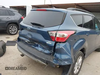 2018 Ford Escape SE with VIN 1FMCU0GD0JUC58115, listed as a IAAI auction lot 41578309 with 76,162 mi miles. Bid and sale history available at carsss.com. Image 6.