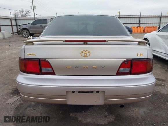 1996 Toyota Camry DX with VIN 4T1BG12K8TU738565, listed as a IAAI auction lot 41702096 with 100,587 mi miles. Bid and sale history available at carsss.com. Image 17.