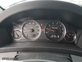 2010 Jeep Grand Cherokee Laredo with VIN 1J4RR4GT7AC120604, listed as a Copart auction lot 84257724 with 60,827 mi miles and Salvage Title. Bid and sale history available at carsss.com. Image 9.