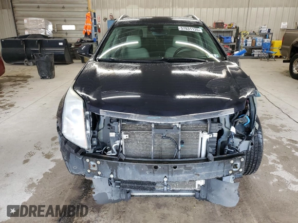 2016 Cadillac SRX Luxury Collection z VIN 3GYFNEE30GS583467, wystawiony jako Copart lot #57831135 z przebiegiem 139 890 mil mil oraz Szkoda całkowita • Salvage title. Historia ofert i sprzedaży dostępna na DreamBid. Obrazek 5.