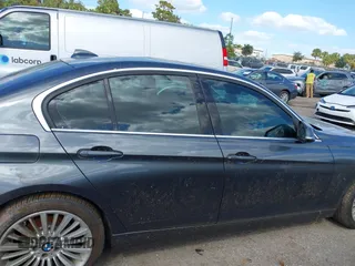2013 BMW 3 Series 328i xDrive with VIN WBA3B3G56DNR81144, listed as a IAAI auction lot 40620694 with 159,022 mi miles. Bid and sale history available at carsss.com. Image 13.