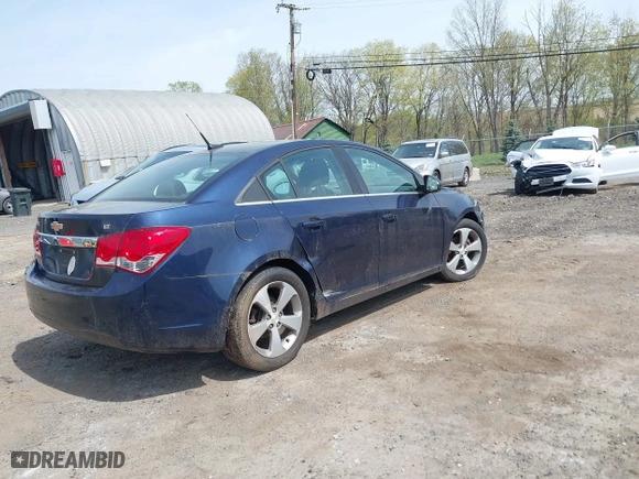 2011 Chevrolet Cruze LT w/2LT with VIN 1G1PG5S92B7235702, listed as a IAAI auction lot 42100947 with 85,759 mi miles. Bid and sale history available at carsss.com. Image 4.
