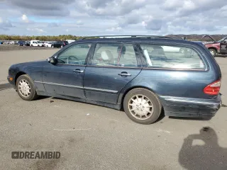 2001 Mercedes-Benz E-Class AWD with VIN WDBJH82J81X052002, listed as a Copart auction lot 82832724 with 187,464 mi miles and Salvage Title. Bid and sale history available at carsss.com. Image 2.