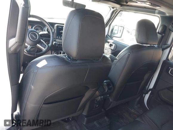 2021 Jeep Wrangler Unlimited Sahara z VIN 1C4HJXEN2MW528137, wystawiony jako IAAI lot #42134514 z przebiegiem 50 030 mil mil oraz . Historia ofert i sprzedaży dostępna na DreamBid. Obrazek 20.