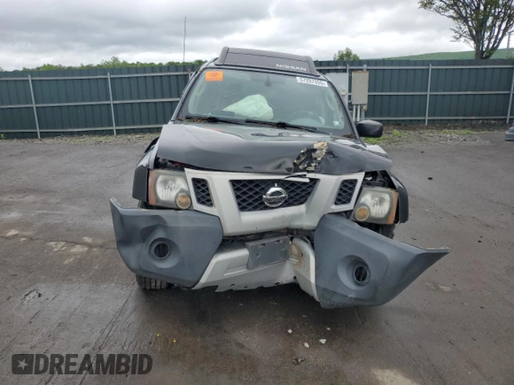 2011 Nissan Xterra S z VIN 5N1AN0NWXBC504569, wystawiony jako Copart lot #57297355 z przebiegiem 151 680 mil mil oraz Szkoda całkowita • Salvage title. Historia ofert i sprzedaży dostępna na DreamBid. Obrazek 5.
