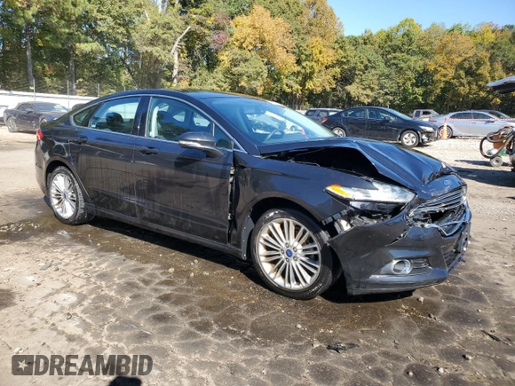 2014 Ford Fusion SE with VIN 3FA6P0H90ER323616, listed as a Copart auction lot 77161924 with 69,699 mi miles and Salvage Title. Bid and sale history available at carsss.com. Image 4.