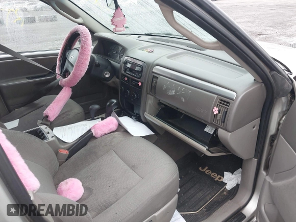 2004 Jeep Grand Cherokee Laredo with VIN 1J4GW48N24C230058, listed as a IAAI auction lot 42386914 with Not provided miles and . Bid and sale history available at DreamBid. Image 5.