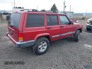 1999 Jeep Cherokee Sport with VIN 1J4FT68S1XL596443, listed as a IAAI auction lot 41767289 with 192,826 mi miles and . Bid and sale history available at DreamBid. Image 4.