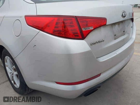 2013 Kia Optima LX with VIN KNAGM4A79D5377485, listed as a IAAI auction lot 41290306 with 172,253 mi miles. Bid and sale history available at carsss.com. Image 18.