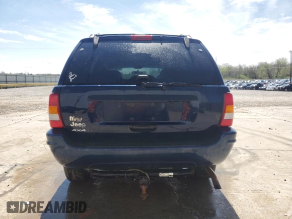 2004 Jeep Grand Cherokee Laredo with VIN 1J4GW48S24C343496, listed as a Copart auction lot 51631915 with 186,216 mi miles and Salvage Title. Bid and sale history available at carsss.com. Image 6.