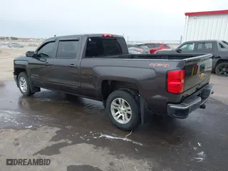 2015 Chevrolet Silverado 1500 LT with VIN 3GCUKREC6FG155529, listed as a IAAI auction lot 41821751 with 157,419 mi miles. Bid and sale history available at carsss.com. Image 3.