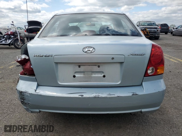 2004 Hyundai Accent GL z VIN KMHCG45C94U574027, wystawiony jako Copart lot #57463905 z przebiegiem 139 595 mil mil oraz Szkoda całkowita • Salvage title. Historia ofert i sprzedaży dostępna na DreamBid. Obrazek 6.