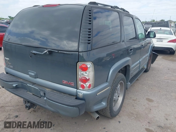 2004 GMC Yukon SLT z VIN 1GKEC13Z44J310511, wystawiony jako IAAI lot #42011475 z przebiegiem 218 746 mil mil oraz . Historia ofert i sprzedaży dostępna na DreamBid. Obrazek 4.