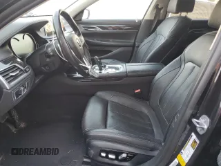 2019 BMW 7 Series 740i with VIN WBA7E2C52KB217153, listed as a Copart auction lot 65205835 with 61,981 mi miles and Clean title. Bid and sale history available at DreamBid. Image 7.