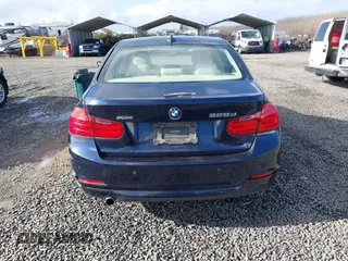 2014 BMW 3 Series 328d xDrive with VIN WBA3D5C53EKX95091, listed as a IAAI auction lot 41696613 with 117,982 mi miles. Bid and sale history available at carsss.com. Image 16.