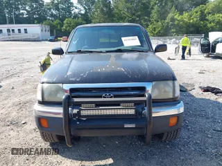 1999 Toyota Tacoma PreRunner with VIN 4TASN92N4XZ566820, listed as a IAAI auction lot 42583069 with 283,325 mi miles and . Bid and sale history available at DreamBid. Image 13.