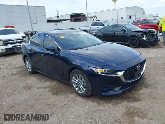 2023 Mazda 3 S z VIN 3MZBPAAM2PM361827, wystawiony jako IAAI lot #42389609 z przebiegiem 17 697 mil mil oraz . Historia ofert i sprzedaży dostępna na DreamBid. Obrazek 1.