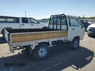 1994 Toyota Tacoma with VIN CM600012981, listed as a Copart auction lot 64052155 with 237,536 mi miles and Salvage title. Bid and sale history available at DreamBid. Image 3.