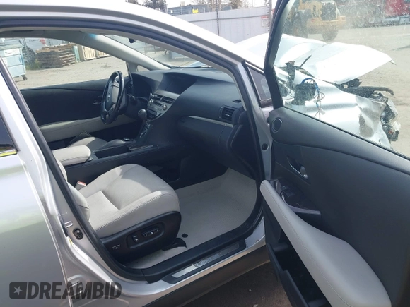 2015 Lexus RX 450h with VIN 2T2ZB1BA7FC002089, listed as a IAAI auction lot 41826675 with 100,852 mi miles and . Bid and sale history available at DreamBid. Image 5.