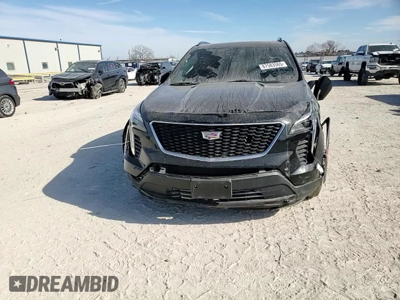 2023 Cadillac XT4 FWD Sport with VIN 1GYFZER47PF107311, listed as a Copart auction lot 87583565 with 26,585 mi miles and Salvage title. Bid and sale history available at DreamBid. Image 12.
