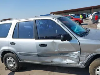 2001 Honda CR-V LX with VIN JHLRD28481S008385, listed as a IAAI auction lot 41863464 with 140,949 mi miles. Bid and sale history available at carsss.com. Image 13.